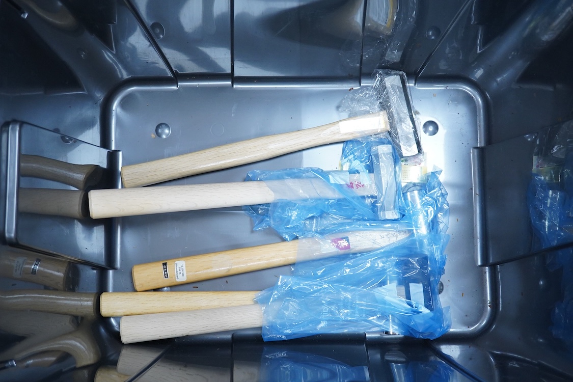 A collection of Japanese woodworking chisels and hammers, including; three boxed large mortise chisels, three boxed timber framing chisels (largest 90mm), and five heavy duty hammers/mallets (11)